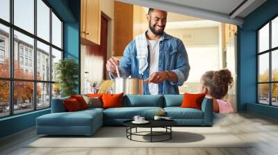 I hope youre hungry.... Shot of a man bonding with his daughter while cooking at home. Wall mural