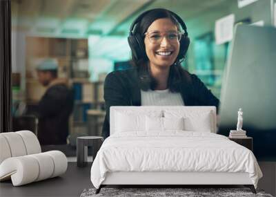 No one can bother me, not in the slightest. Portrait of a young woman using a headset in a modern office. Wall mural