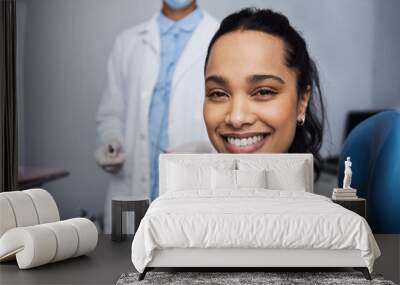 See what good dental health can do for your smile. Portrait of a young woman having dental work done on her teeth. Wall mural