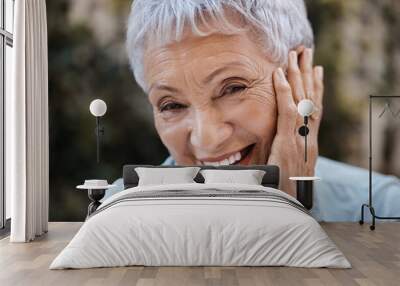 These arent wrinkles, just signs of a life well lived. Shot of a senior woman in the garden at home. Wall mural