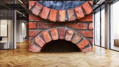 Horizontal red bricks with two opposing arches with partial motifs in circular openings Wall mural