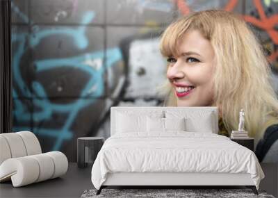 blonde urban teen girl against grafitti wall Wall mural