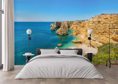 A view of the beach and coastline at Praia da Marinha, Algarve, Portugal. Wall mural