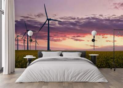 Wind turbines that produce electricity, built on a field in Skanderborg, Denmark Wall mural