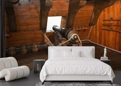 Gun cannon on vintage sailing ship Wall mural