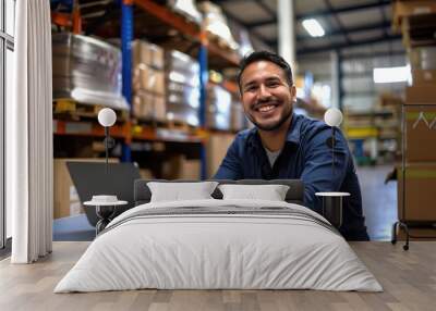 Middle aged hispanic warehouse distribution logistic deliery centre manager or employee preofessional smiling at camera with toothy smile surrounded with shelves with cardboard boxes Wall mural