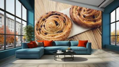 Two spiral french sweet buns, horizontal shot Wall mural