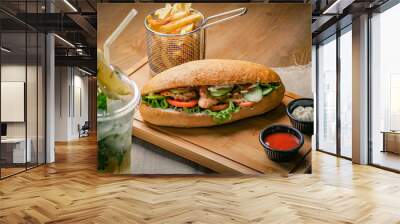 Tasty chicken sandwich and fresh mohito Wall mural