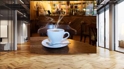 closeup of a cup of coffee at coffee shop Wall mural