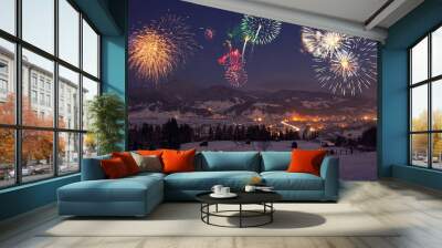 fireworks at mountain landscape. view of holiday city Wall mural