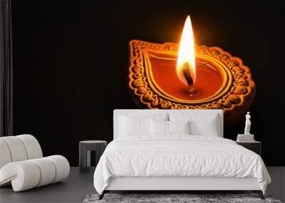 A Clay Diya with a Lit Wick and Molten Wax Wall mural