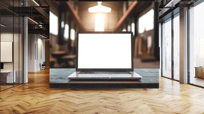 Laptop with blank screen on table in industrial interior.  with blank screen on blur modern hall backgrounds Wall mural