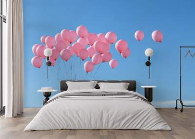 Pink Balloon Release: A skyward view of dozens of pink balloons being released into the clear blue sky, symbolizing hope and remembrance. The balloons should vary in shades of pink, and a few clouds c Wall mural