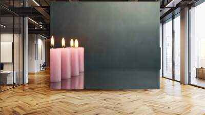 Pink Candle Vigil: A serene image of several pink candles burning in a row, with soft, warm light casting gentle shadows. The candles should be arranged on a reflective surface, and the flames should  Wall mural