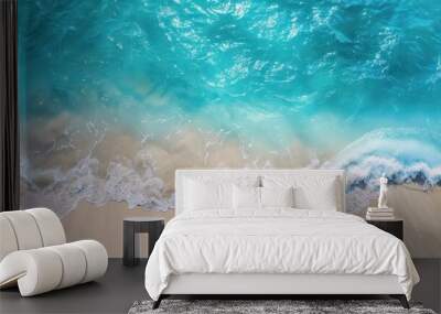 The ocean is calm and the water is blue. The sand is white and the waves are gentle Wall mural