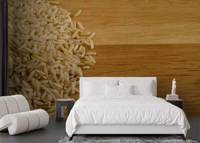 brown rice on wood, background Wall mural