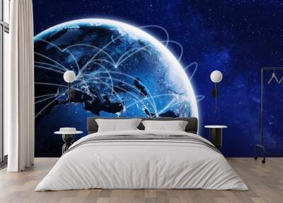 Connections around planet Earth viewed from space at night, cities connected around the globe by shiny lines, international travel or global business finance, world connectivity, elements from NASA Wall mural