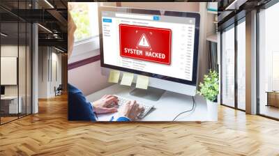 System hacked alert on computer screen after cyber attack on network. Cybersecurity vulnerability on internet, virus, data breach, malicious connection. Employee working in office. Wall mural