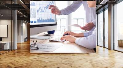 traders with forex trading charts and graphs on computer screen Wall mural