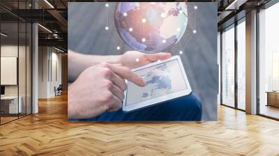 World wide business concept, person using AR tablet, 3D globe Wall mural