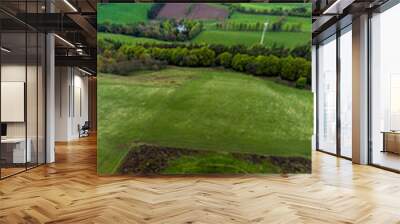 A panorama aerial view over the Cairnpapple Hill burial site in Scotland on a summers day Wall mural