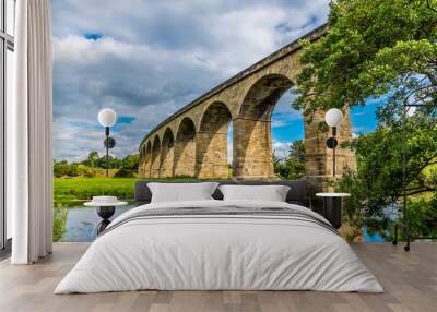 The Arthington Viaduct crosses the River Wharfe in Yorkshire, UK in summertime Wall mural