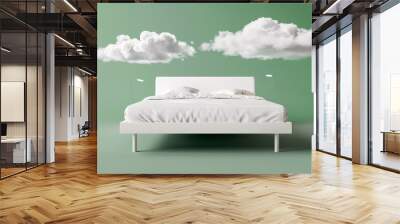 a bed with white clouds above it Wall mural