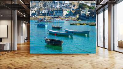 Boats moored in harbour at beautiful British coastal town St Ives, Cornwall, England Wall mural