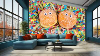 Berliner, krapfen, food for carnival with funny eyes and streamers Wall mural