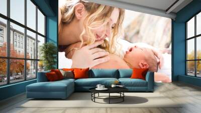 newborn baby with mother Wall mural