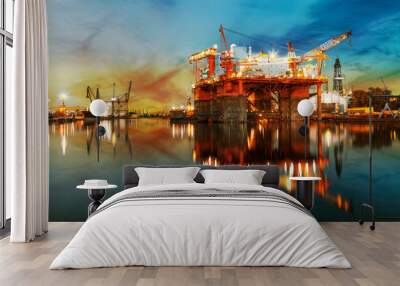 Ship under construction in shipyard at sunrise. Wall mural