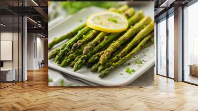 Asparagus, grilled asparagus with lemon slices on a white plate, elegant dining setting, natural daylight, vibrant and appetizing mood, neatly arranged presentation, casual tableware Wall mural