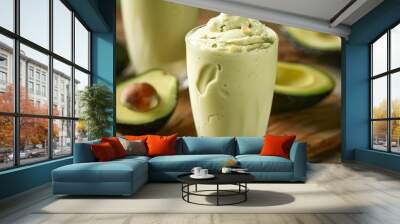 A creamy avocado shake made with fresh avocados and sweet vanilla ice cream, a perfect blend of health and indulgence Wall mural