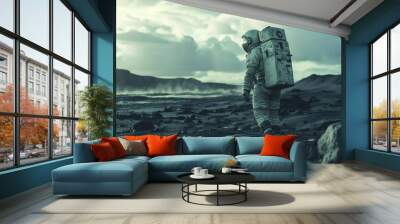 A man in a spacesuit is walking across a barren landscape, desolate and barren Wall mural