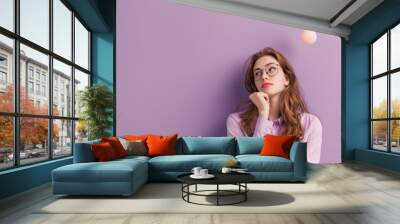 Young Woman Brainstorming Ideas in Office Wall mural