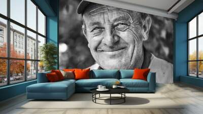 Portrait of smiling old man with wrinkled face. Black and white portrait . Wall mural