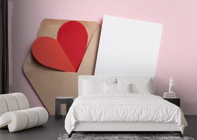 Happy Valentines day card mockup with red heart in envelope on pink Wall mural