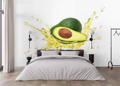 Avocado essential oil splash with fresh fruit isolated on white background. Wall mural