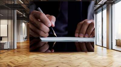 businessman signing a document Wall mural