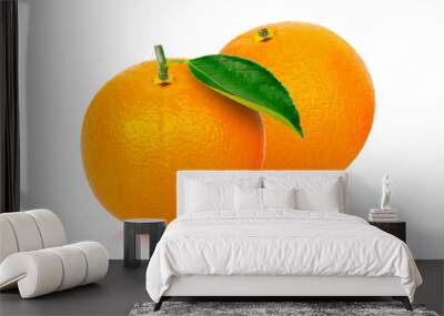 Closeup two fresh organic orange fruit with green leaf isolated on white background. Full depth of field. Wall mural