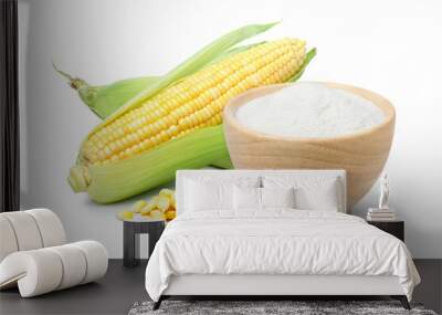 Corn starch in wooden bowl and fresh sweet corn isolated on white background.  Wall mural