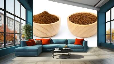 Roasted coffee beans and coffee powder (ground coffe) in wooden bowl isolated on white background. Wall mural