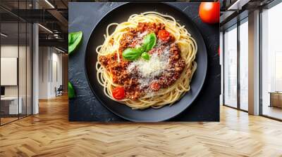 Pasta spaghetti bolognese with minced beef sauce, tomatoes, parmesan cheese and fresh basil in a plate on black tile background. Italian food, top view. Generative ai Wall mural