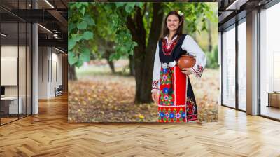 Young girl with bulgarian costume Wall mural