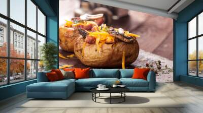 Baked stuffed potatoes with bacon, cheddar, mushrooms and dill Wall mural