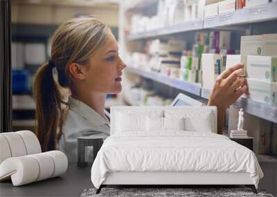 According to this online tool, this medication will work best. Shot of a pharmacist using her digital tablet while working in a isle. Wall mural