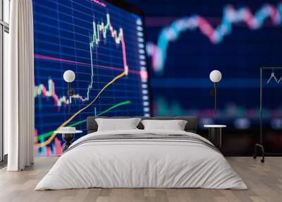 Background on a financial theme. Trader charts on monitors. Selective narrow focus. Wall mural