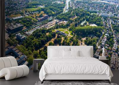 Strasbourg, France. Orangerie Park - 17th-century park with a boat lake. Panorama of the city on a summer morning. Sunny weather. Aerial view Wall mural