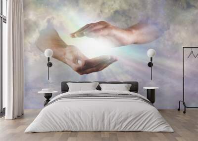 Let there Be Light Divine Concept -  God's hands emerging from beautiful clouds, cupped, with rainbow colored bright white star burst of light between and copy space Wall mural