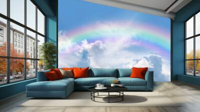 Stunning blue sky panoramic rainbow - big fluffy clouds with a giant arcing rainbow against a  beautiful summer time blue sky with copy space for messages
 Wall mural